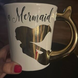 Mermaid mug with gold tail.